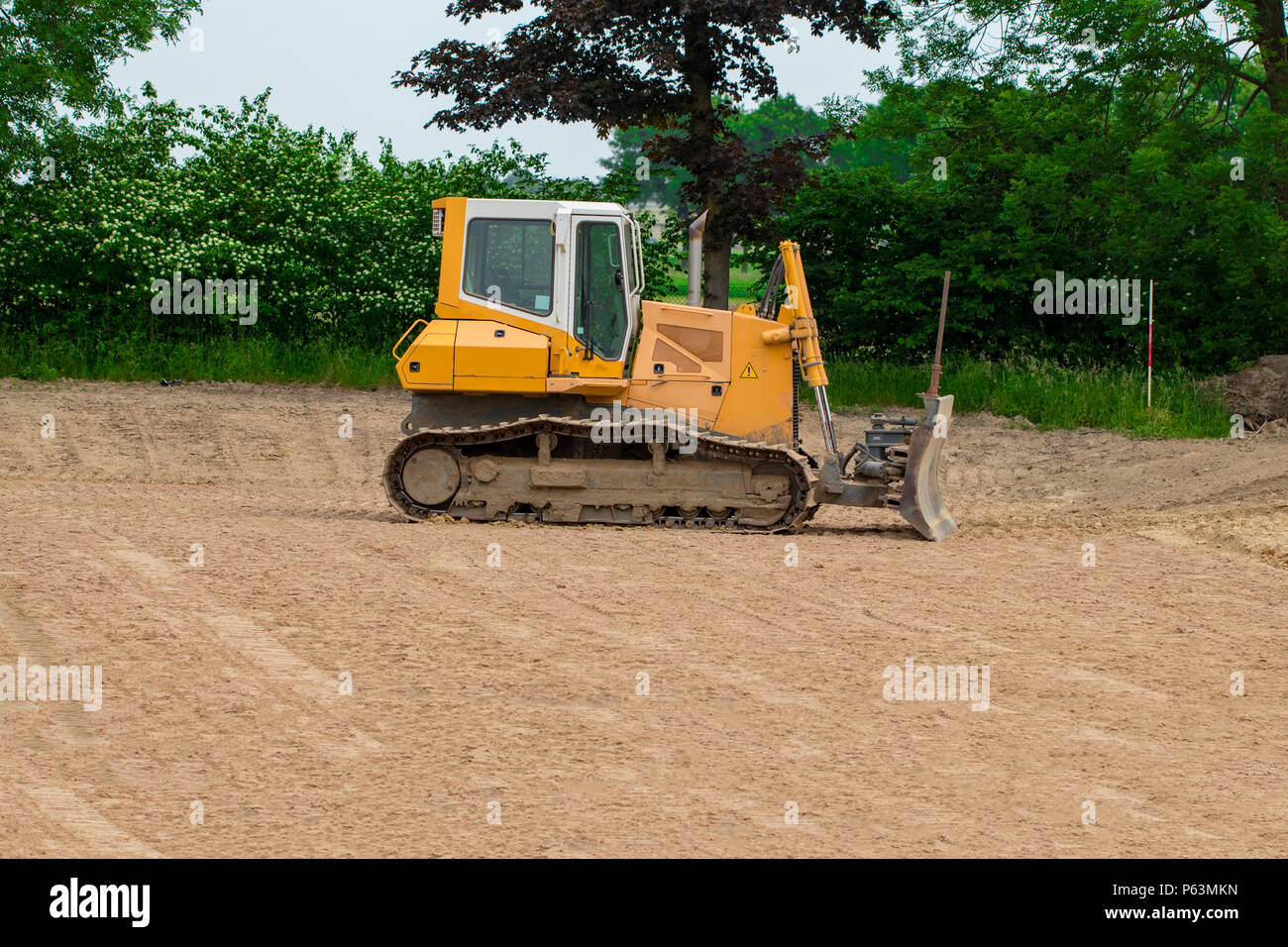 Crawler bulldozer. Lateral view of a crawler bulldozer. Stock Photo