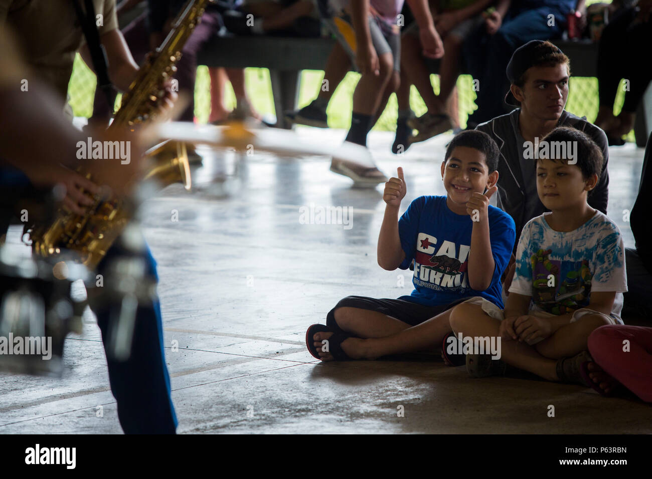 Students from South Pacific Academy, American Samoa watch the U.S.