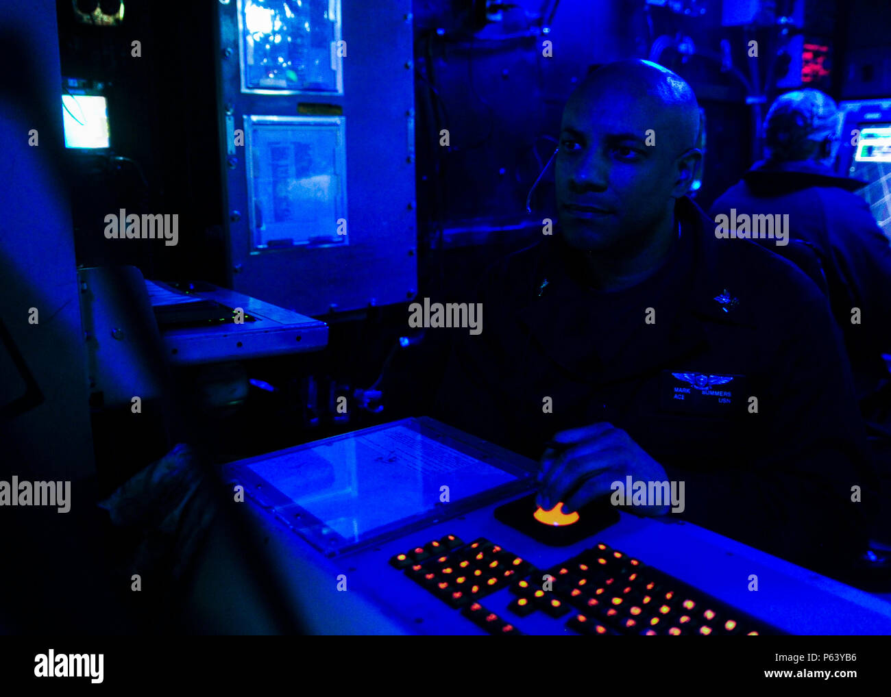 160419-N-VH385-030 ATLANTIC OCEAN (April 19, 2016) – Air Traffic Controller 1st Class Mark Summers, from Statesville, North Carolina, mans the departure control system during flight operations aboard the aircraft carrier USS George Washington (CVN 73). Washington, homeported in Norfolk, is underway conducting carrier qualifications in the Atlantic Ocean. (U.S. Navy photo by Mass Communication Specialist 3rd Class Wyatt L. Anthony/Released) Stock Photo