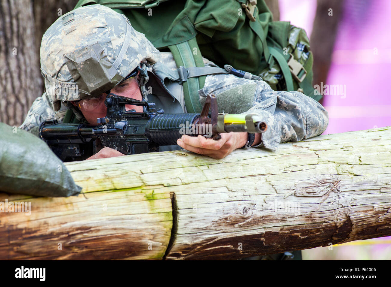 A U.S. Army Ranger from the 1st Infantry Division navigates simulated ...