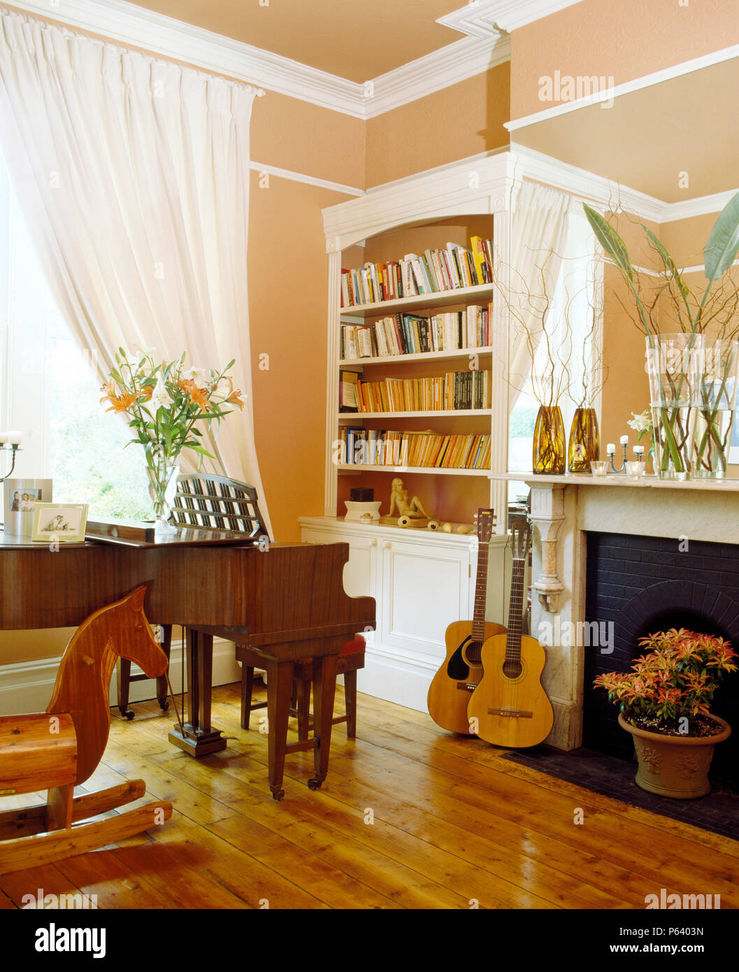 Grand Piano And Guitars In Living Room With Highly Polished Wooden