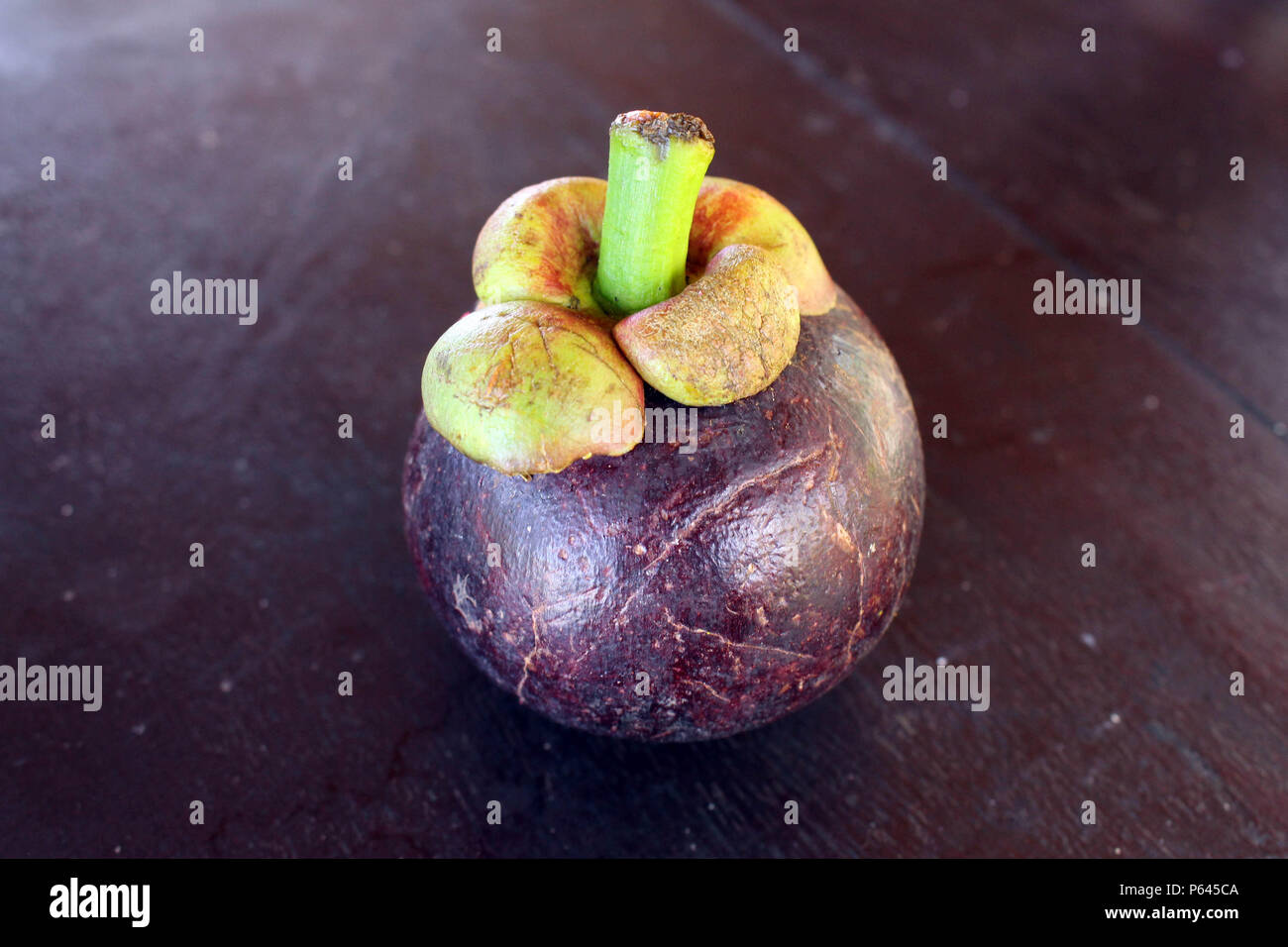 Purple mangosteen, a tropical fruit. Locally known as "manggis" in