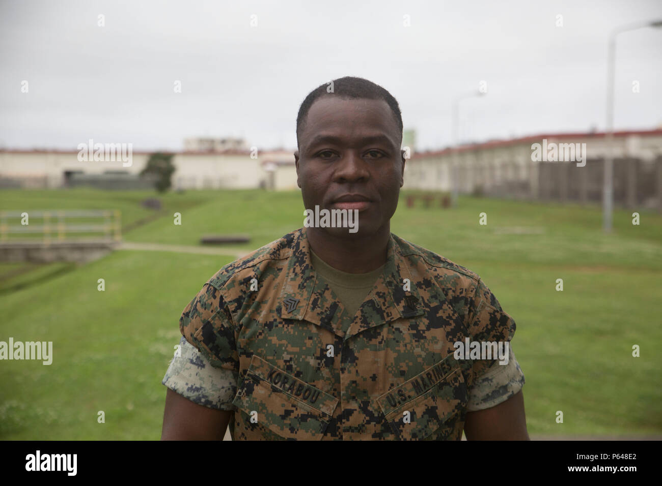 Sgt. Doudoubite Korabou poses for a picture on April 11, 2016. Korabou is part of 7th Communication Battalion and is the chief instructor at III MHG corporal’s course where teaches classes, organizes administration work and provides knowledge and leadership to his subordinates.     (U.S. Marine Corps photo by LCpl. Kelsey Dornfeld/ Released) Stock Photo