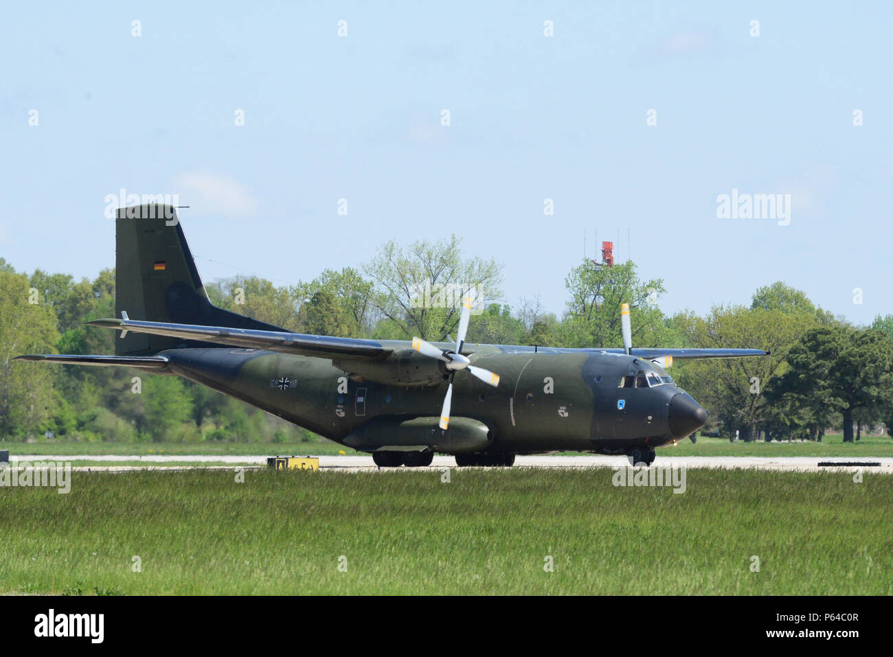 A German C-160 aircraft lands to deliver German munitions containers at Scott Air Force Base, Illinois, April 22, 2016. 375th Logistics Readiness Squadron personnel helpeded transfer the munitions to a semi-trailer truck, which took them to Boeing in St. Louis, Missouri, for repairs. (U.S. Air Force photo by Staff Sgt. Maria Bowman) Stock Photo