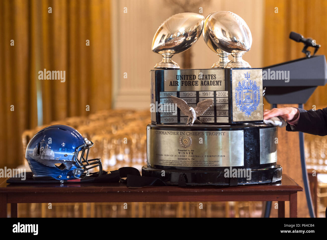 Navy football helmet team ceremony hires stock photography and images