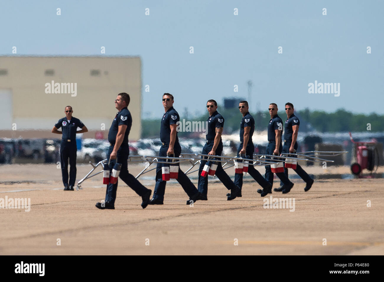 Thunderbirds crew chiefs perform ladder set up for recovering aircraft during the Thunderbirds