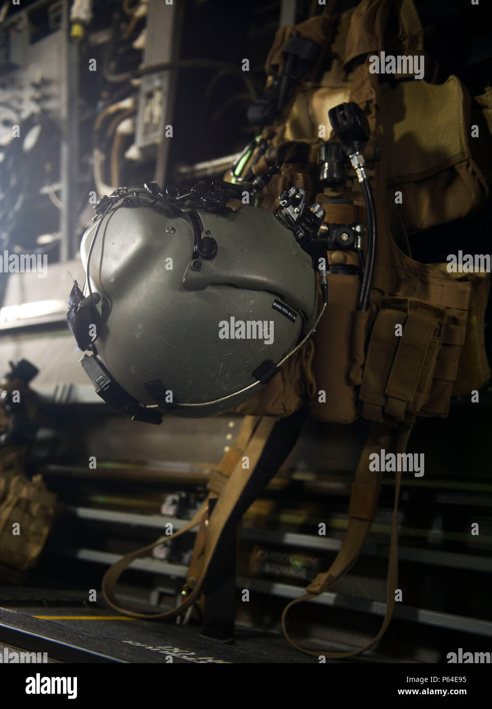 Flight equipment is loaded on a CV-22 Osprey tilt-rotor aircraft at ...