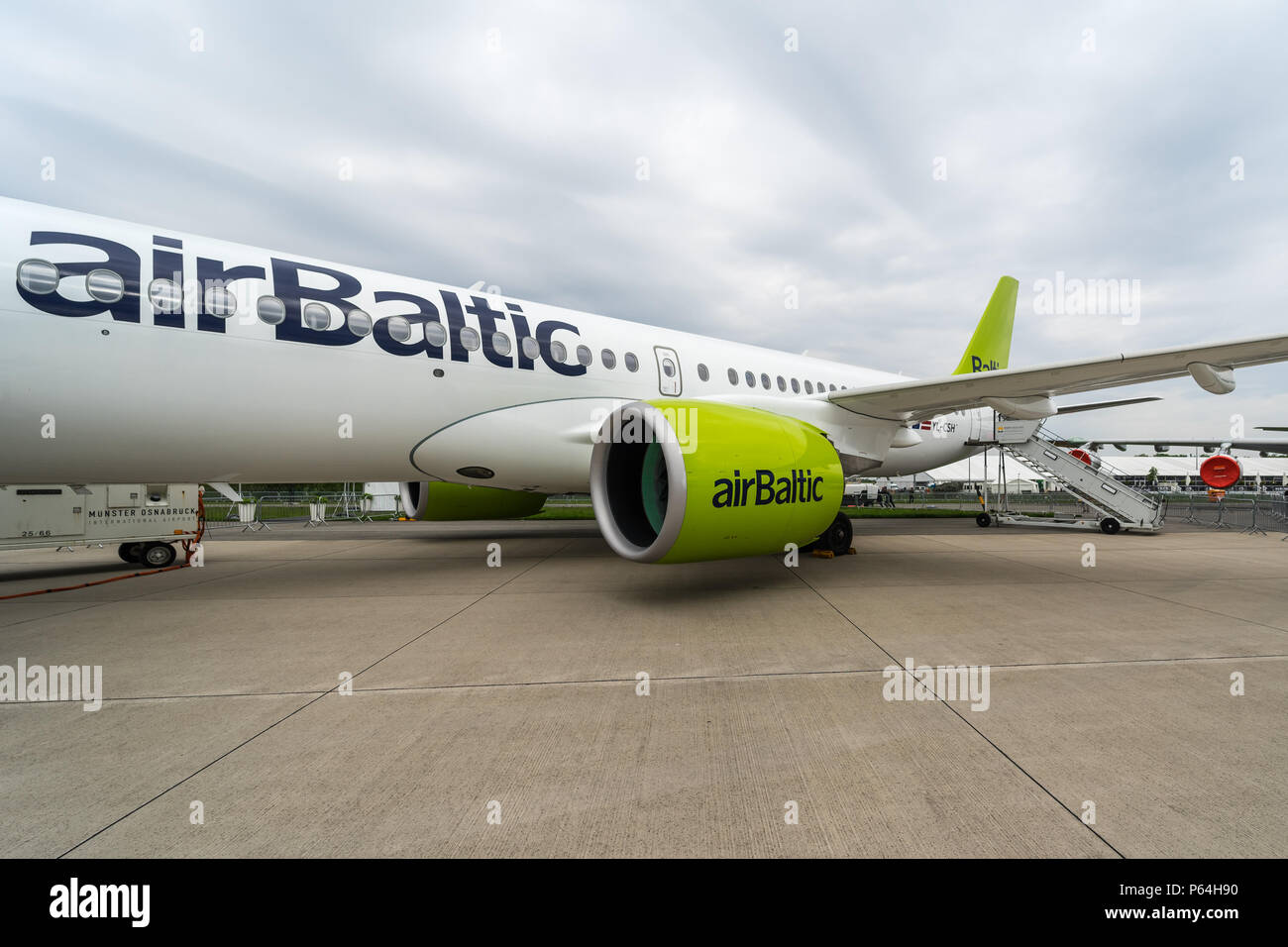 BERLIN, GERMANY - APRIL 25, 2018: Fragment of the narrow-body jet airliner Bombardier CS300, by AirBaltic. Exhibition ILA Berlin Air Show 2018. Stock Photo