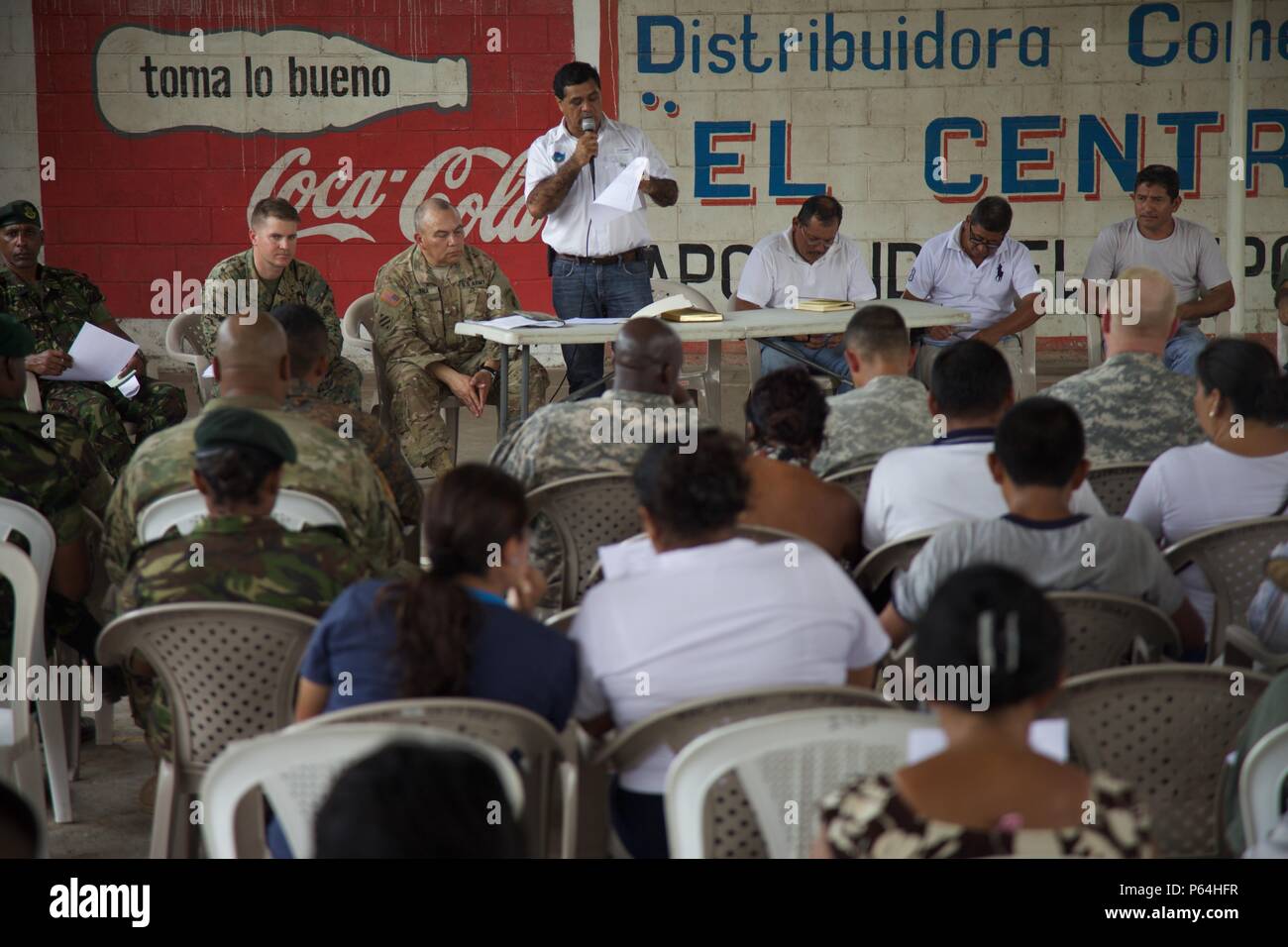 Joint Military members and Mayor Armufo Cordeno speak to the local Cocodes about the future Medical Treatment Exercise as part of The Beyond The Horizon Operation at La Blanca, Guatemala, May 04, 2016. Task Force Red Wolf and Army South conducts Humanitarian Civil Assistance Training to include tactical level construction projects and Medical Readiness Training Exercises providing medical access and building schools in Guatemala with the Guatemalan Government and non-government agencies from 05MAR16 to 18JUN16 in order to improve the mission readiness of US forces and to provide a lasting bene Stock Photo