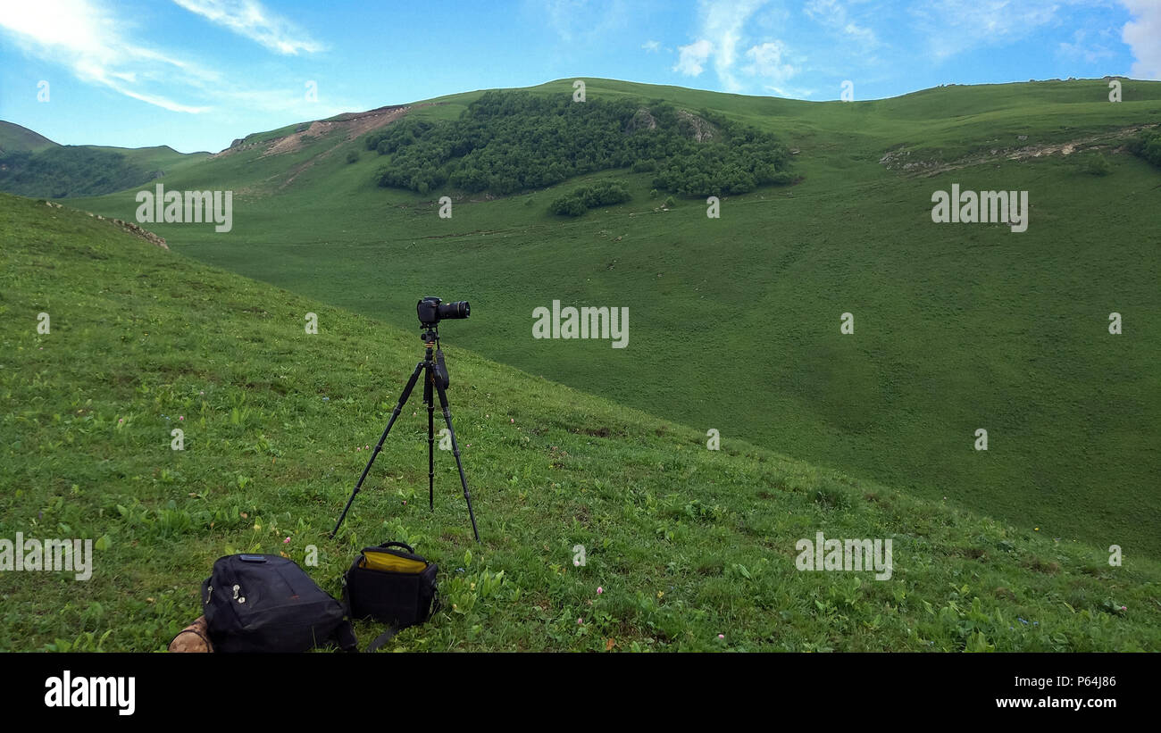 Camera on tripod shooting mountains hi-res stock photography and images ...