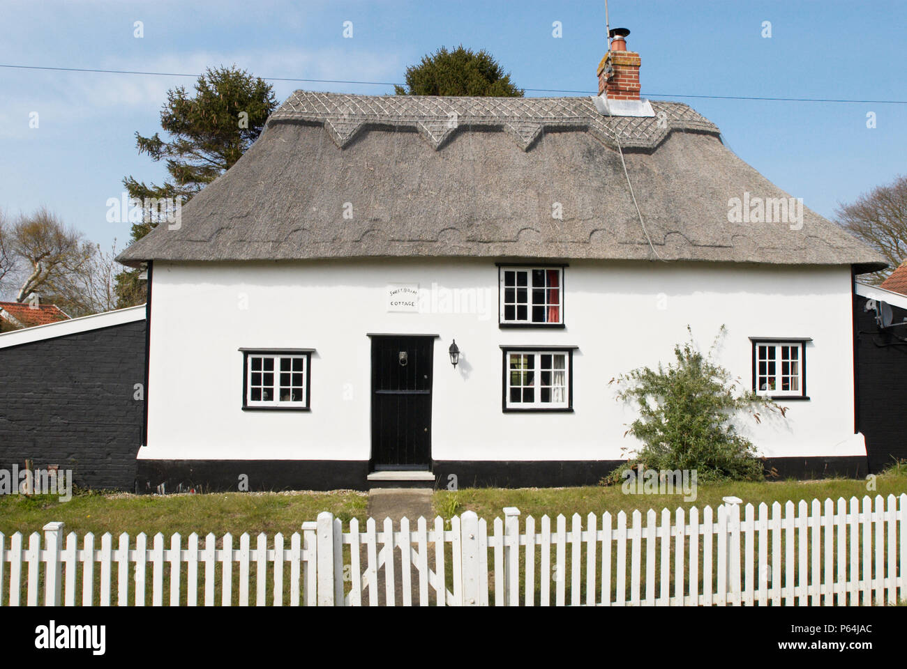 Thatched detached countryside cottage, Middleton, Suffolk, UK Stock Photo