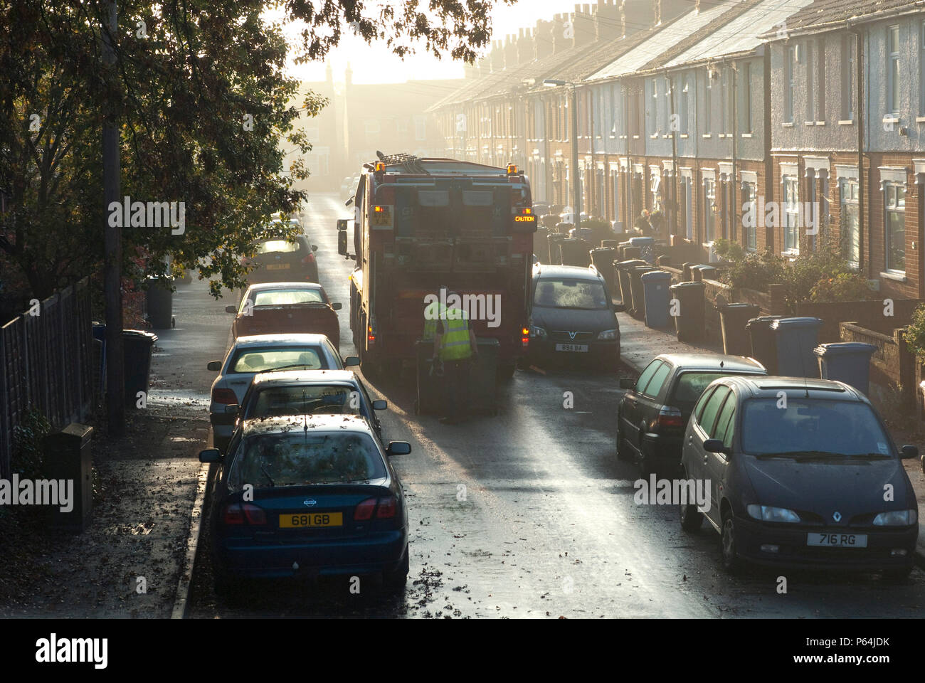 Early morning refuse collection from a residential street in Ipswich, Suffolk, UK Stock Photo