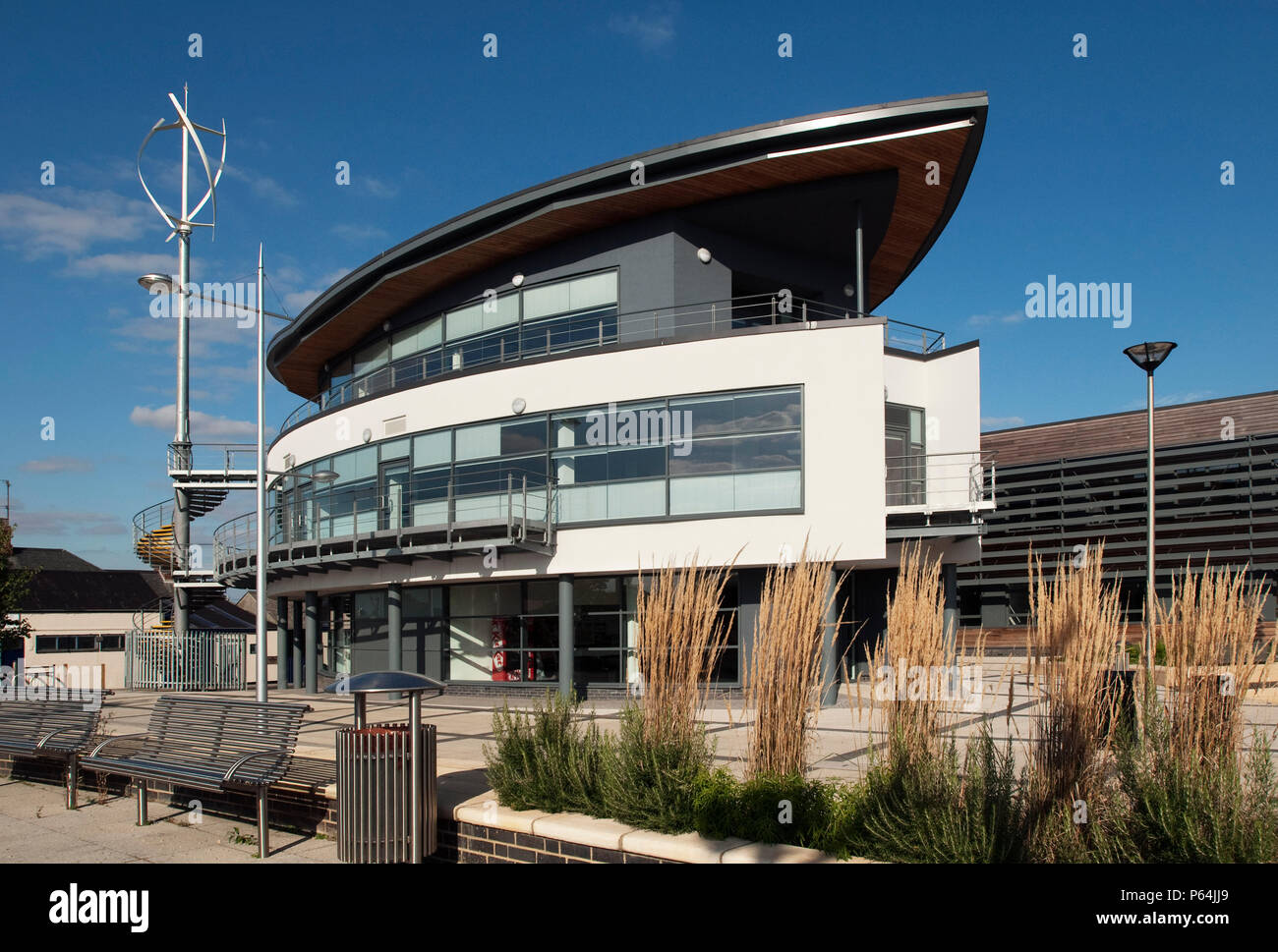Wisbech Boathouse with Vertical axis wind turbine (VAWT), part of the Nene Waterfront Regeneration in Wisbech, Cambridgeshire, UK Stock Photo
