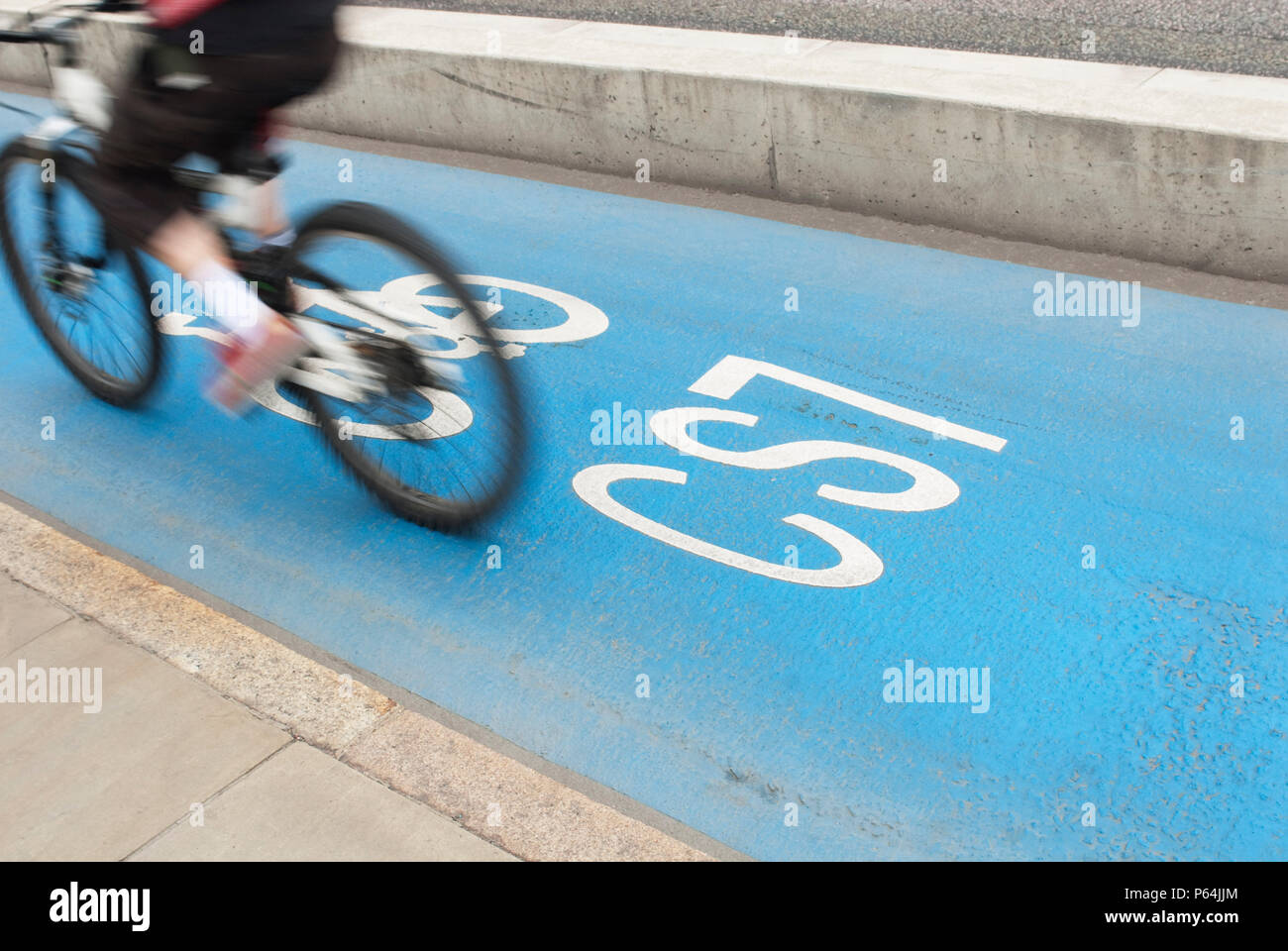 Barclays sponsored Cycle Superhighways, set up to promote cycling along dedicated blue painted cycle lanes into central London from outer London, UK Stock Photo