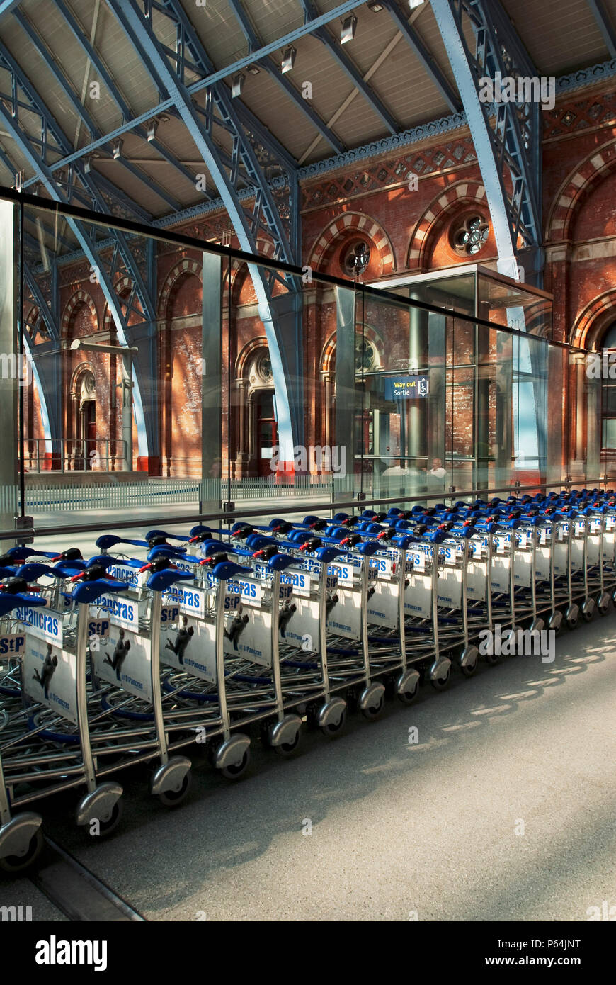 Luggage trolleys at the Eurostar terminal in Kings Cross St Pancras station, London, UK Stock