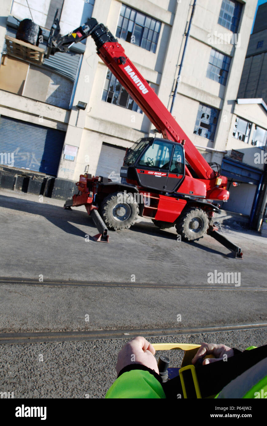 Forklift with heavy load operated with remote control Stock Photo Alamy