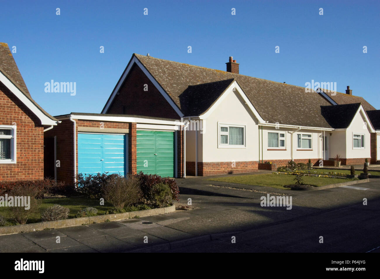 Residential housing and garages in UK Stock Photo