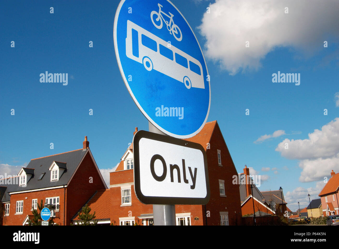 Road sign displaying bus and cycle access only on a new housing development Stock Photo