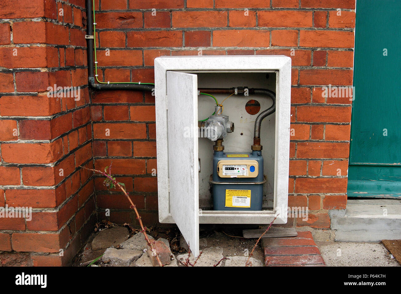 Gas meter cupboard outside a private house. Stock Photo
