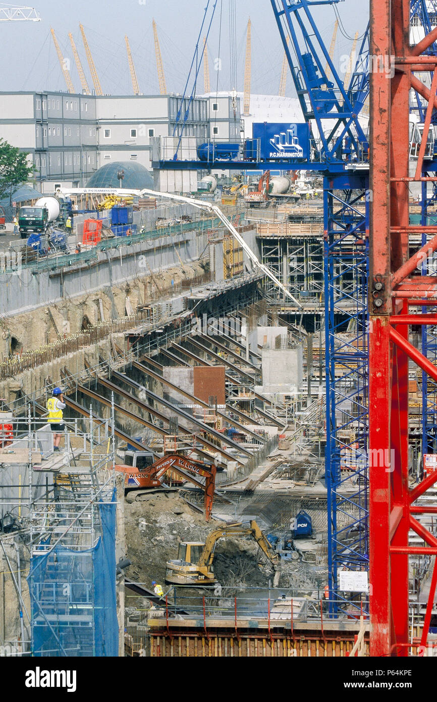 Pumping concrete into foundations of large scale construction site