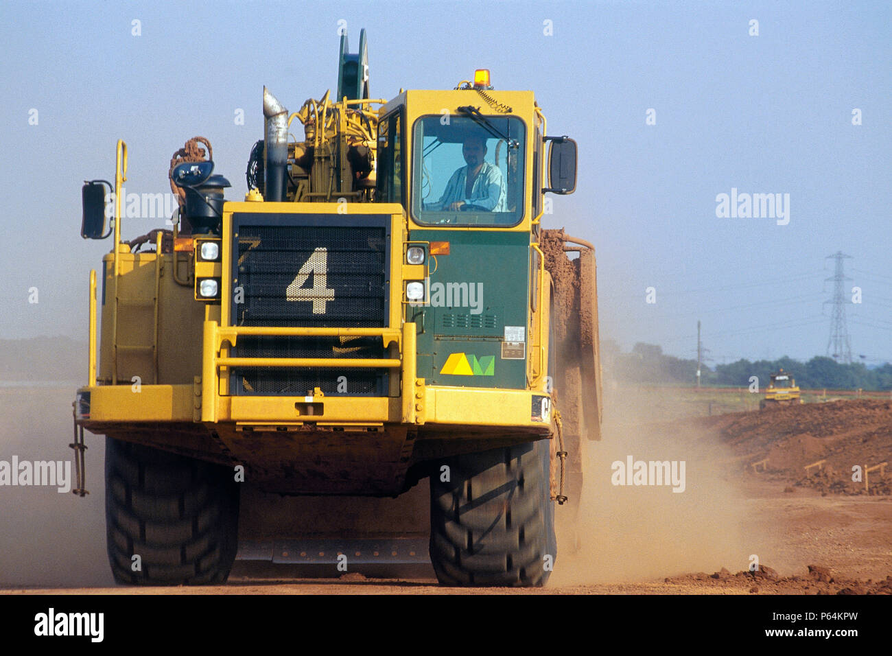 AMPL Caterpillar grader. M6 toll road construction, Birmingham, United Kingdom. Stock Photo
