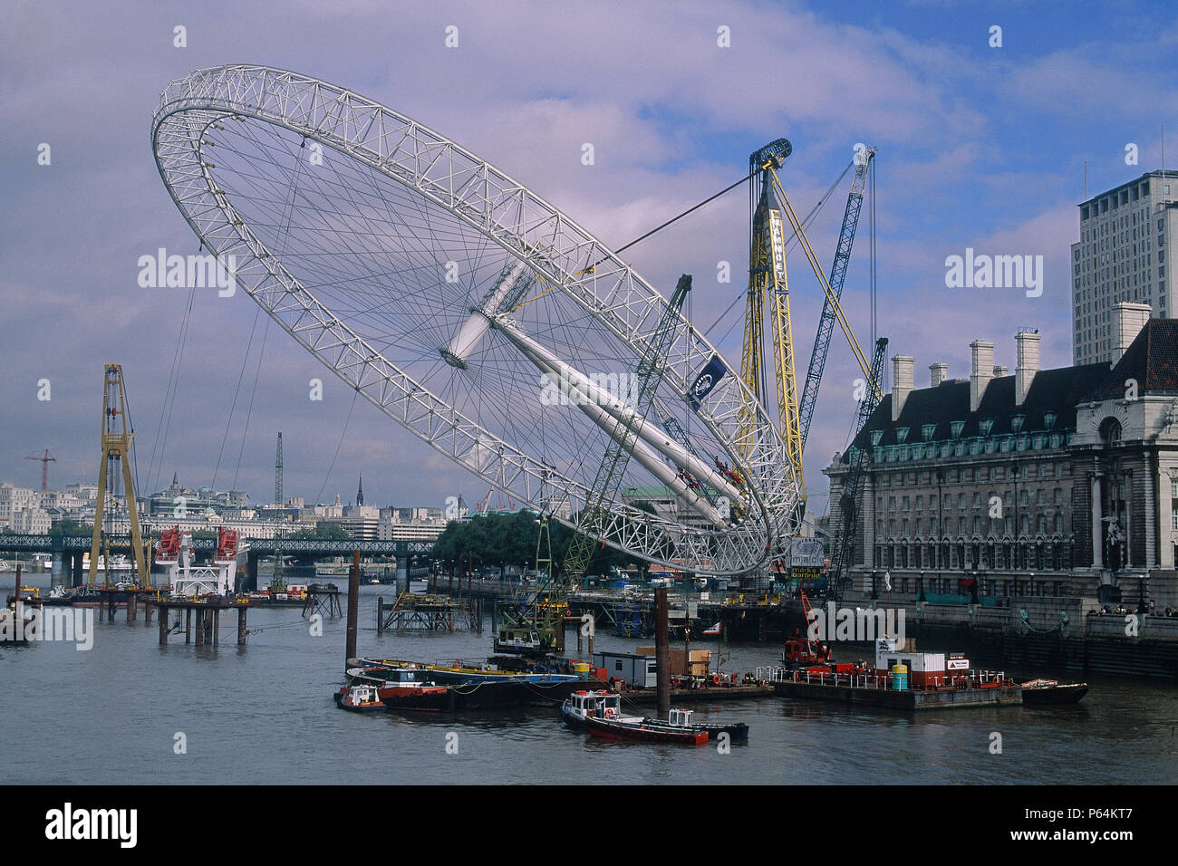 Erection of London Eye, Millennium Wheel. London, United Kingdom. Designed by David Marks and Julia Barfield. Stock Photo
