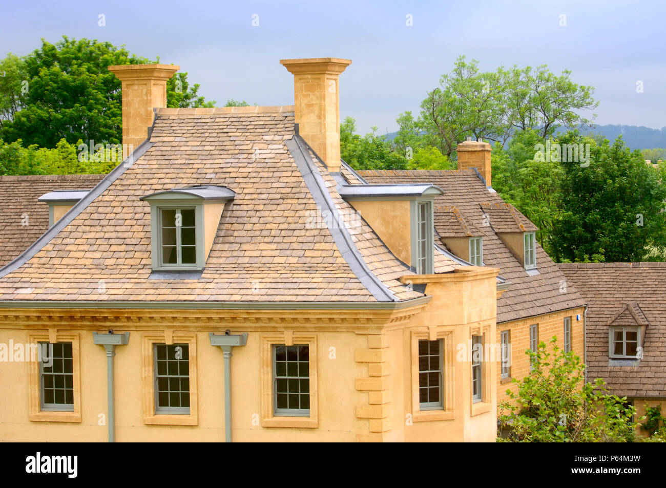 Cotswold stone building with dormer roof windows at Longborough