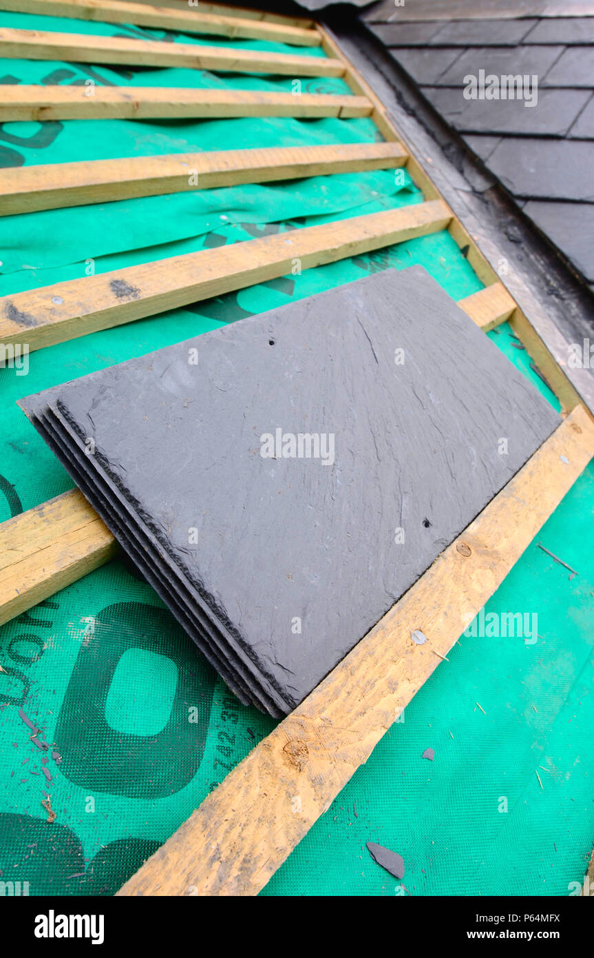 Section of slate roof under construction showing the breathable roofing