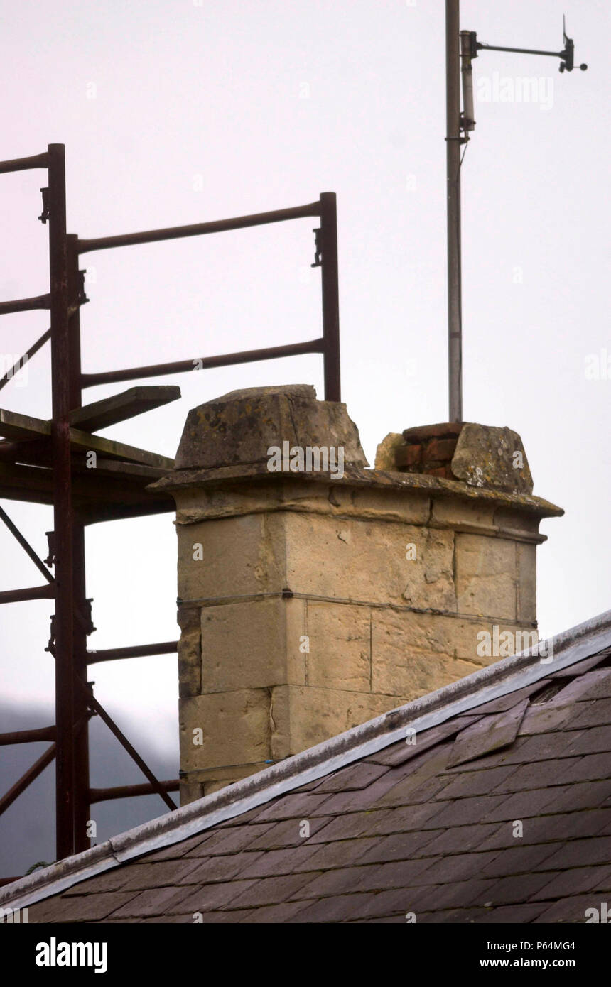 Slate roof being repaired. Stock Photo