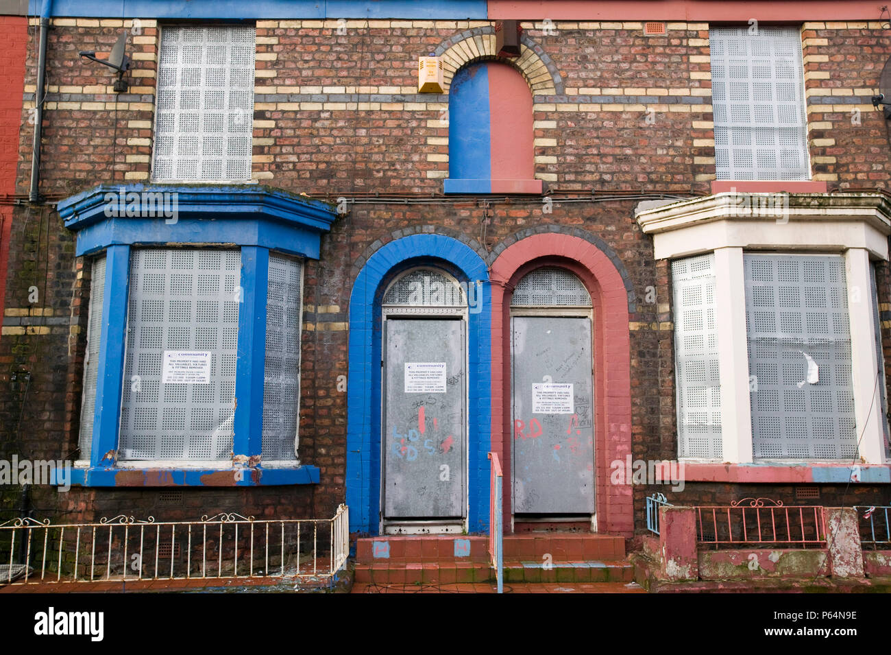 Boarded up houses in the Kensington area of Liverpool UK Stock Photo