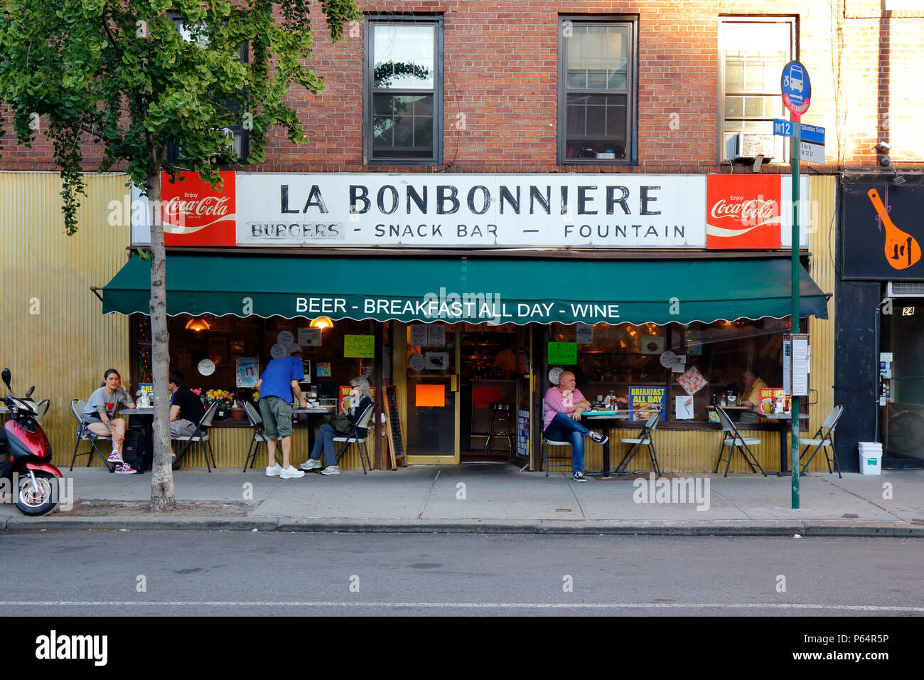 La Bonbonniere, 28 8th Ave, New York, NY. exterior storefront of a restaurant, and sidewalk cafe in the Greenwich Village neighborhood of Manhattan. Stock Photo