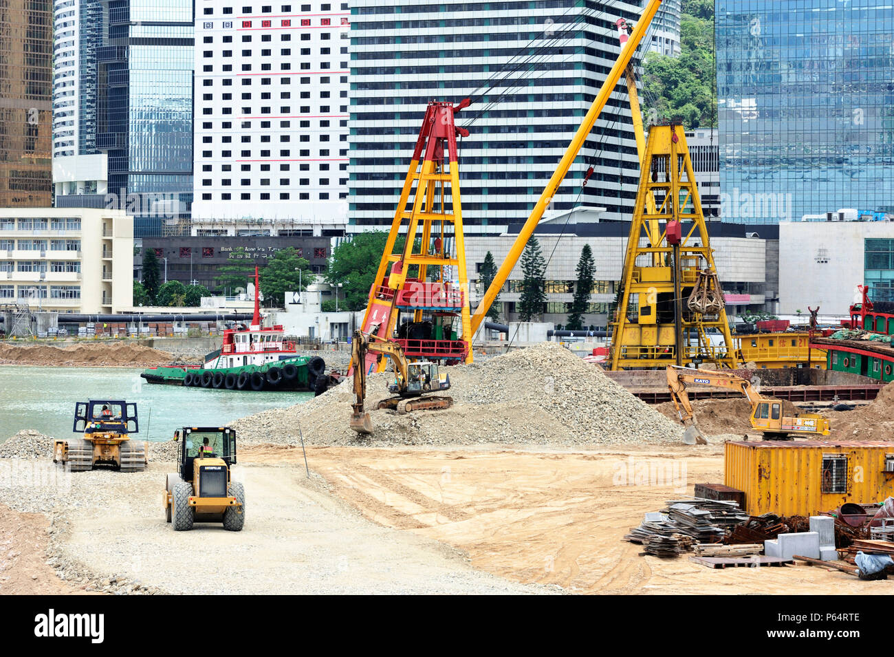 Major reclamation works in progress in Victoria Harbour for future transport and office developments in Hong Kong July 2008 Stock Photo