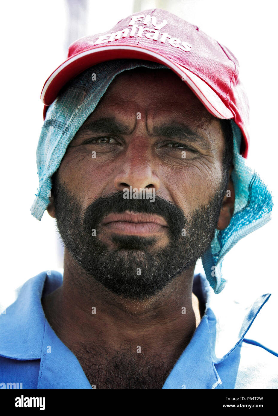 Abdul Khaliq, a construction worker, talks with an ITP reporter on Sheikh Zayed road, Dubai, United Arab Emirates, July 3, 2005. Stock Photo