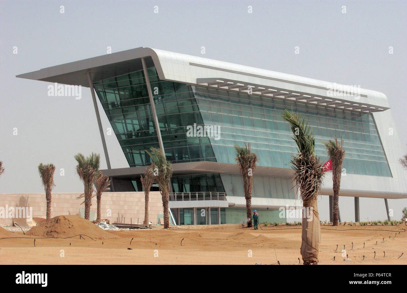 Dubai Autodrome under construction at the Dubailand, Dubai, United Arab Emirates, September 2004. Transforming 7.5km of sandy desert in the heart of D Stock Photo