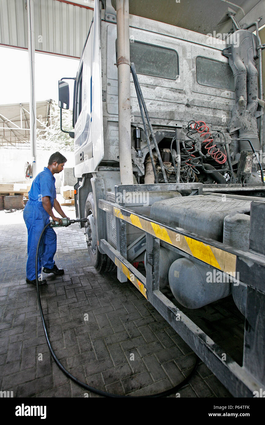 Gargash Motors, Al Qouz,Truck  Mechanics Dubai, United Arab Emirates, June 2007. Stock Photo