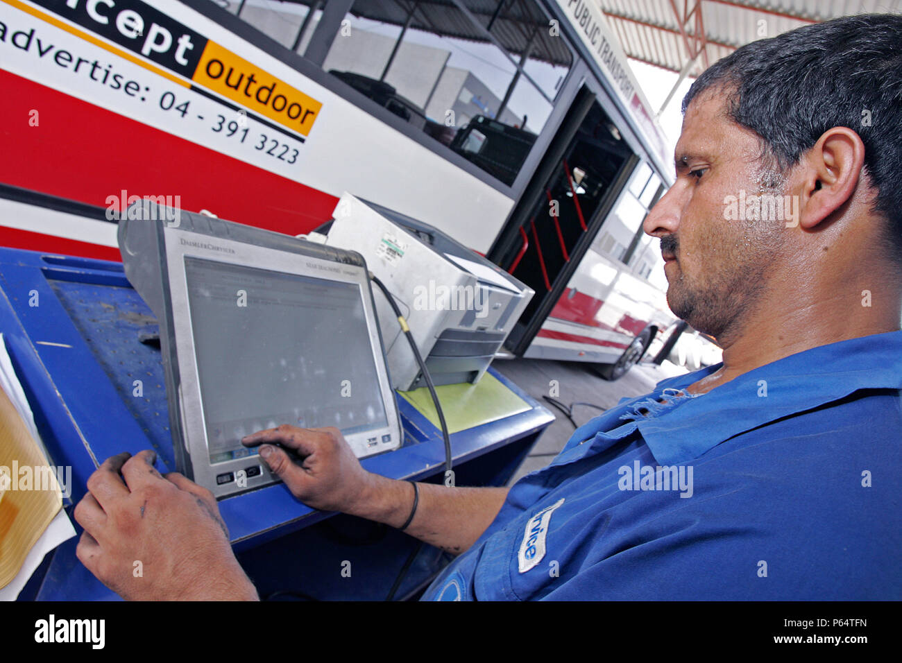 Gargash Motors, Al Qouz,Truck  Mechanics Dubai, United Arab Emirates, June 2007. Stock Photo