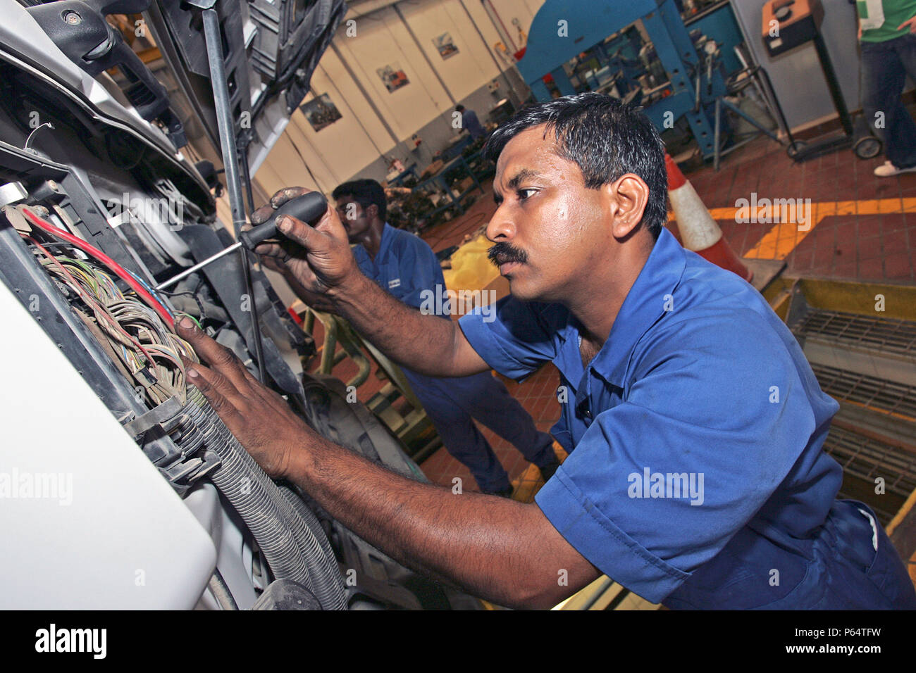 Gargash Motors, Al Qouz,Truck  Mechanics Dubai, United Arab Emirates, June 2007. Stock Photo