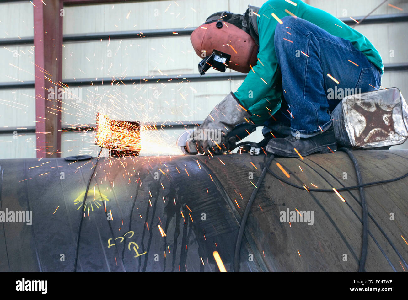 Workers at Hyojong Pipe factory, Doha. Stock Photo