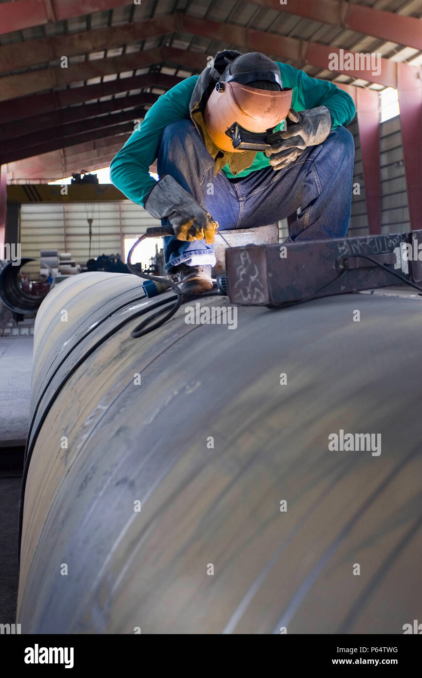 Workers at Hyojong Pipe factory, Doha. Stock Photo