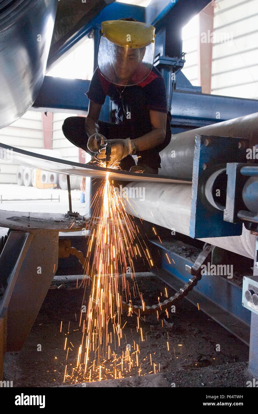 Workers at Hyojong Pipe factory, Doha. Stock Photo