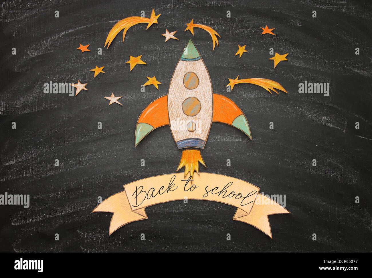 Back to school concept. rocket, space elements shapes cut from paper and  painted over classroom blackboard background Stock Photo - Alamy