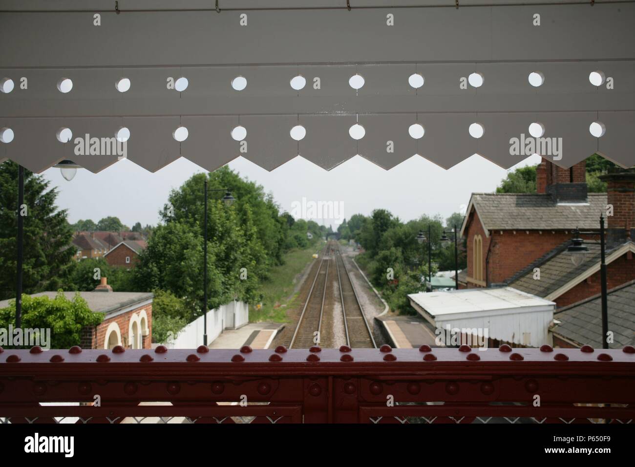 View of the station buildings and track from the newly refurbished footbridge at Codsall station, Staffordshire. 2007 Stock Photo