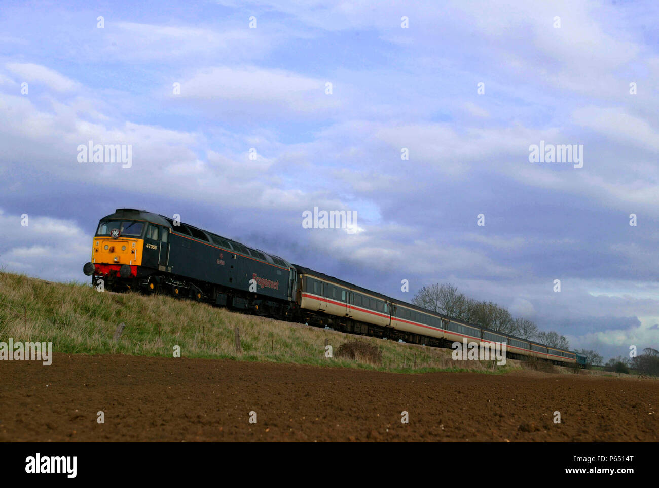 A Fragonset class 47 diesel electric heads the Thames Clyde Express special through the Langtons in Leicestershire on the Midland Main Line on 8th Apr Stock Photo