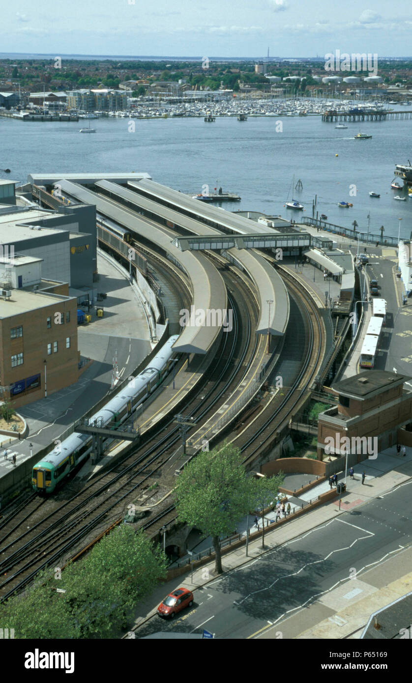 A Govia operated Electrostar leaves Portsmouth Harbour Station on a sunny afternoon. 15th May 2003 Stock Photo