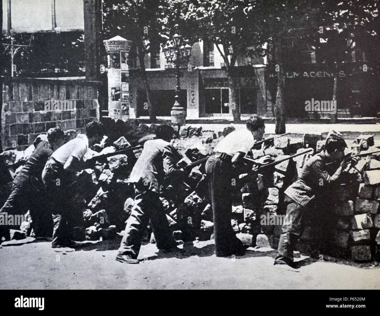 On 19 July 1936 republican barricade in a street in Barcelona. Spanish civil war Stock Photo