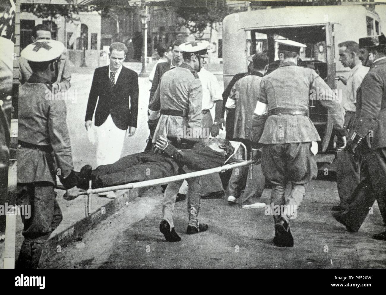 casualty from street fighting arrives at a Barcelona hospital during the Spanish civil war 1938 Stock Photo