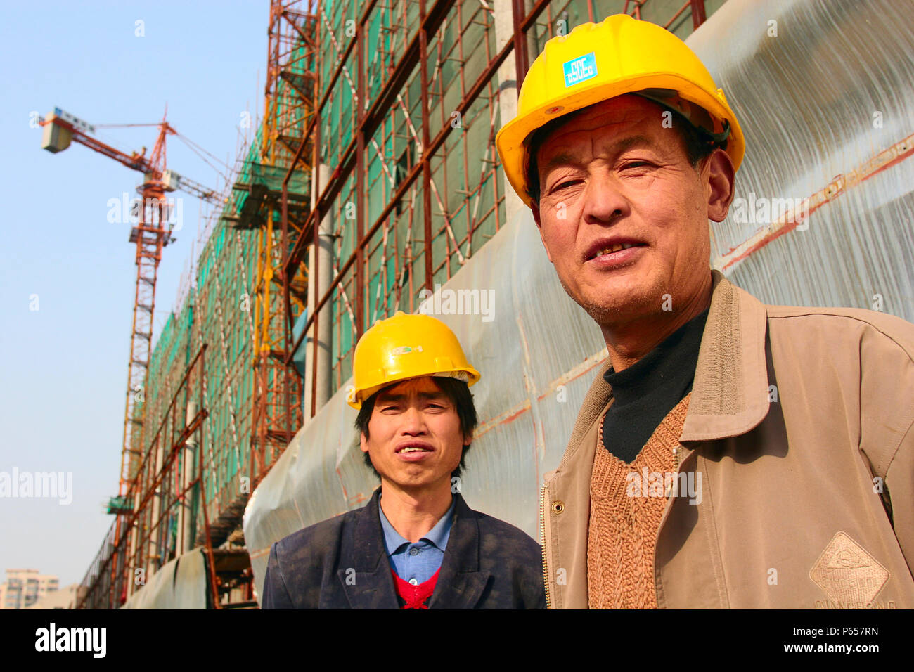 Construction workers in central Beijing. Stock Photo