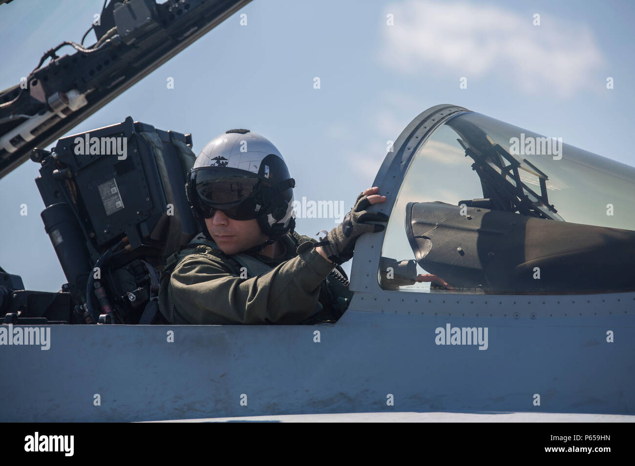 A pilot prepares to take off from the flightline aboard Marine Corps ...