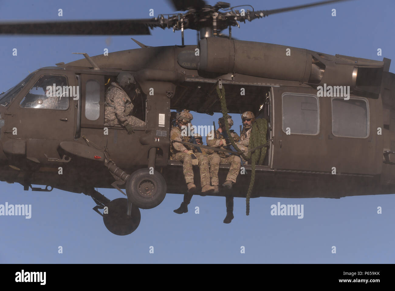 Uh 60 Fast Roping Vector Special Tactics Airmen with the 24th Special Operations Wing fast rope ...