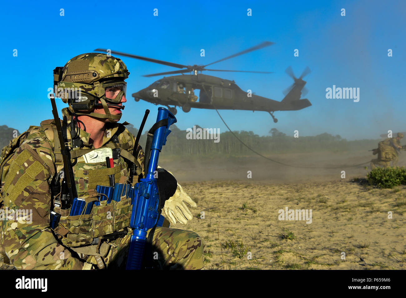 Special Tactics Airmen of the 24th Special Operations Wing fast rope ...